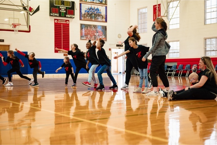 a group of elementary students perform their skit