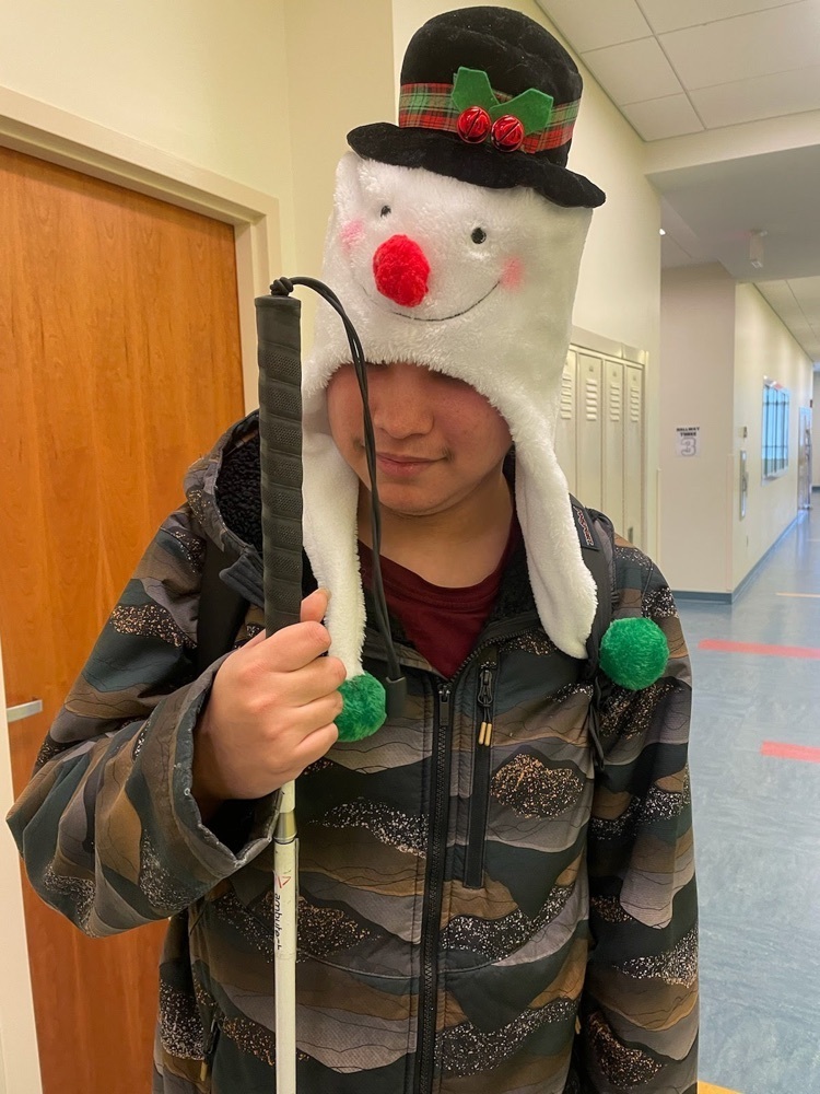 male student wearing a snowman hat 