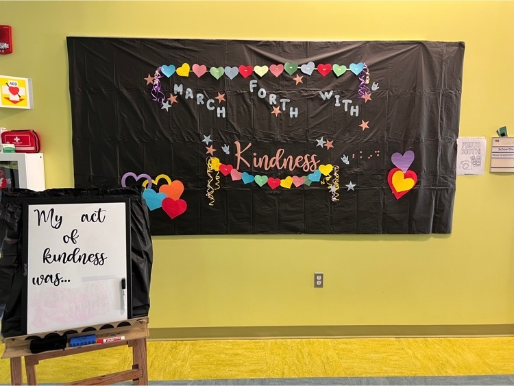 photo backdrop. black background with multicolored hearts and other shapes. text says “March forth with kindness"