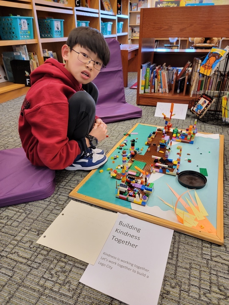 one male student building legos 